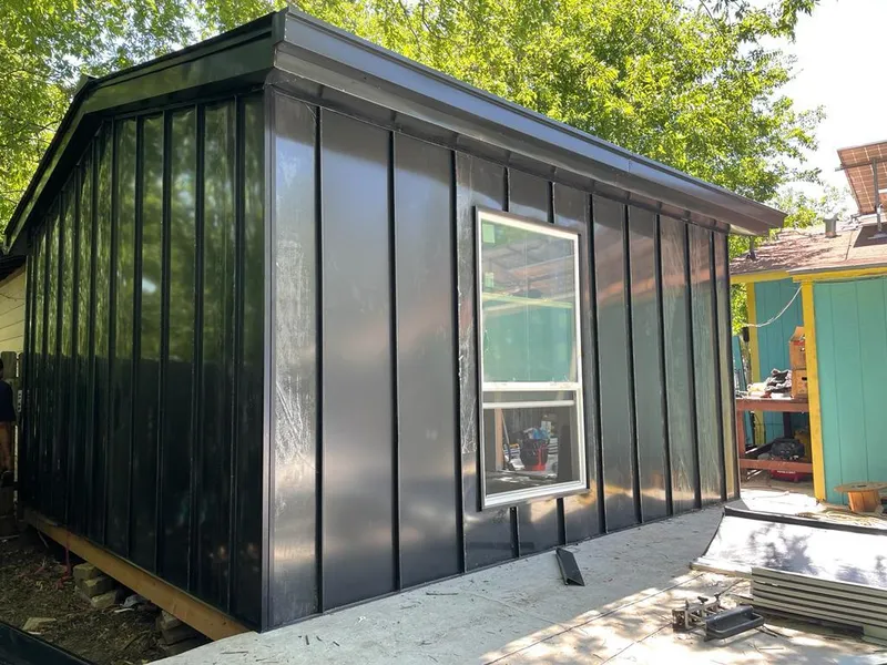 Black standing seam metal wall panels for Roof Inspection in East Orange